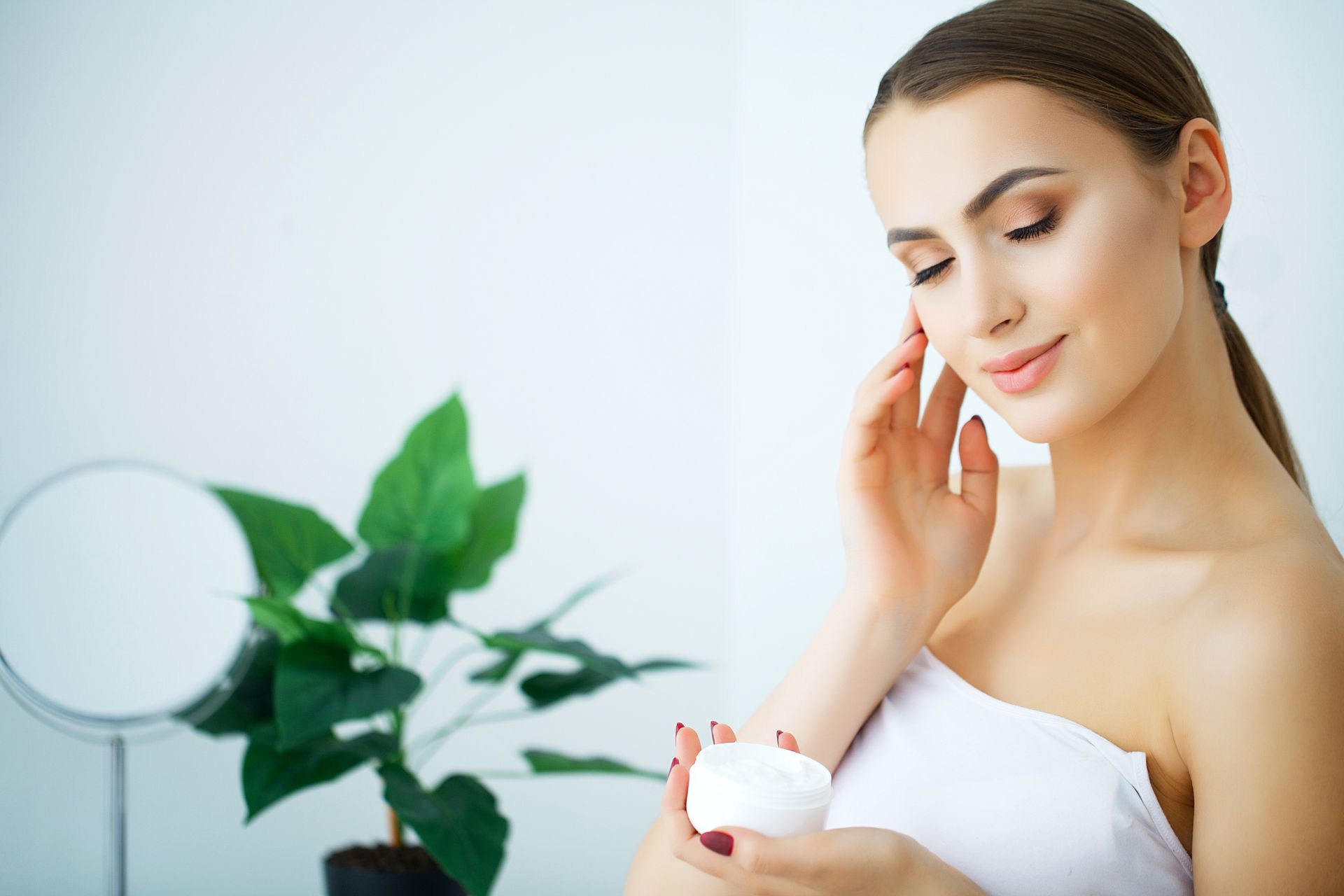 beauty-skin-care-beautiful-woman-applying-cosmeti-2023-02-17-02-21-41-utc
